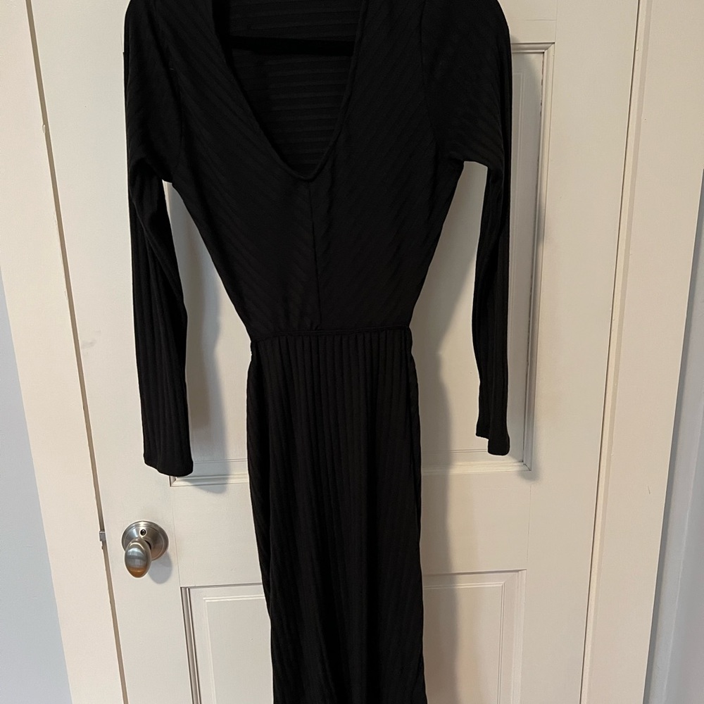 Brand new dress with open lower back